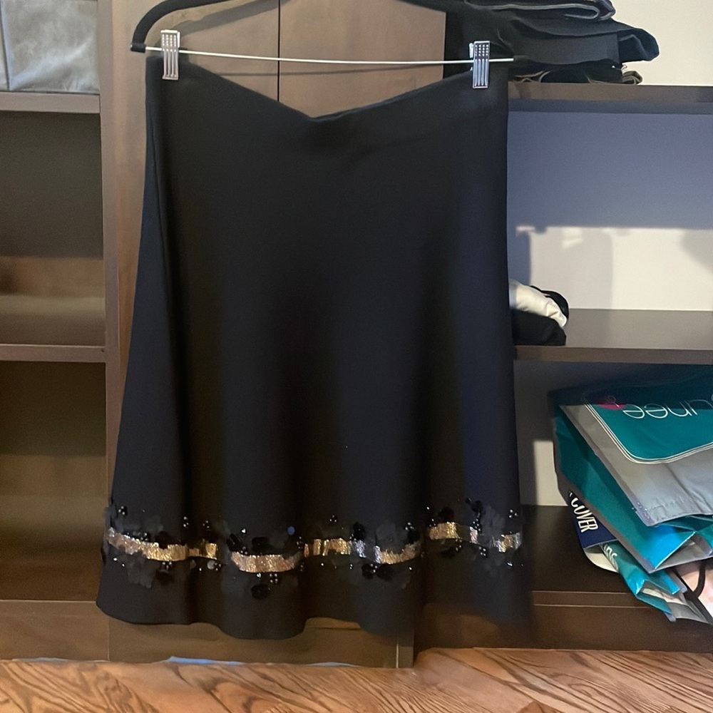 Cristina Paris black stretch skirt with gold and black flowers